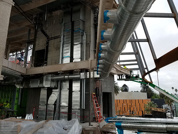 Couts ductwork installation on a project site